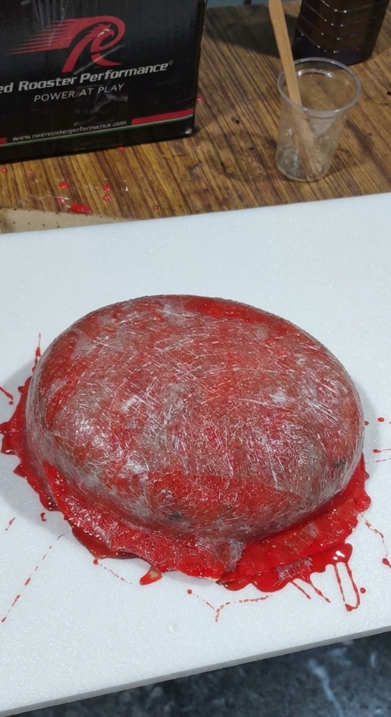 Carbon fibre mold making process — red gel coat applied